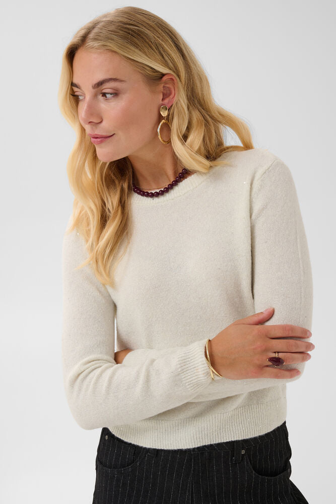 Jolli knit fra Cream – kremhvit med paljetter